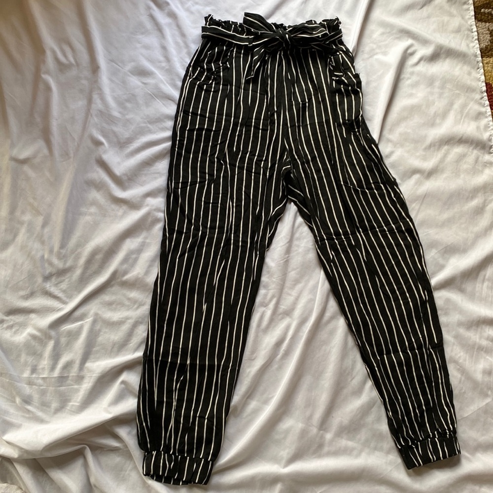 Pinstripe pants. Paper bag top stripes pants with bow belt